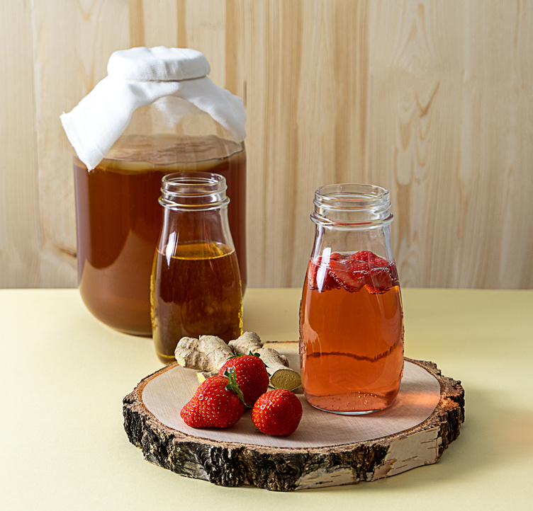 Homemade fermented kombucha tea with berry and ginger