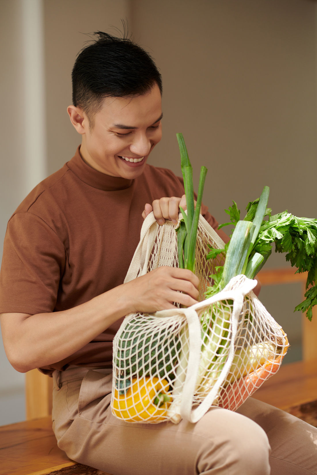 Man Hoding Reusable Grocery Bag