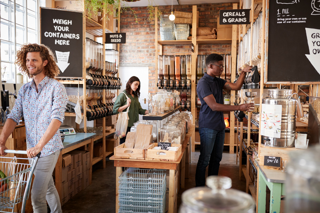 Shoppers in Dried Goods Section of Sustainable Plastic Free Groc